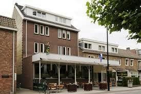 Hotelpand 17 kamers met woonhuis en parking in Valkenburg te koop!